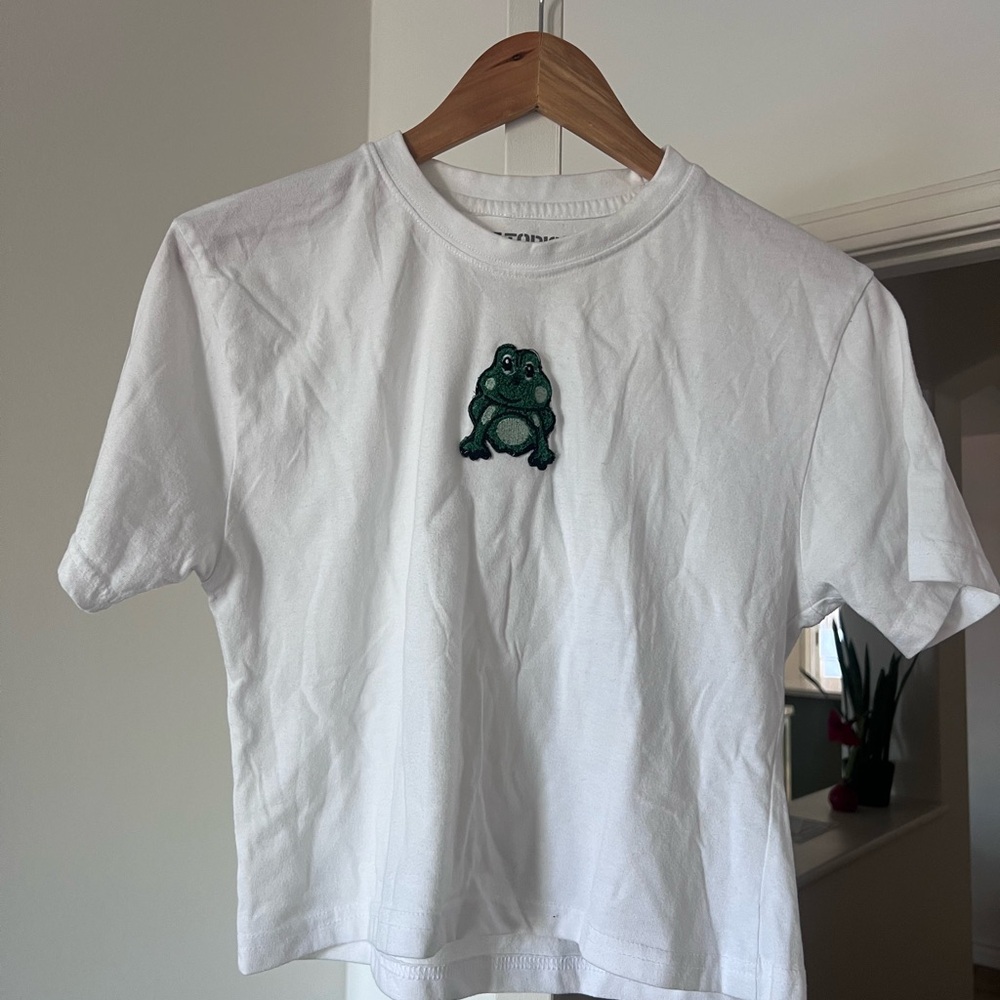 Hot 90s topic baby tee White T-Shirt with Green Frog Patch